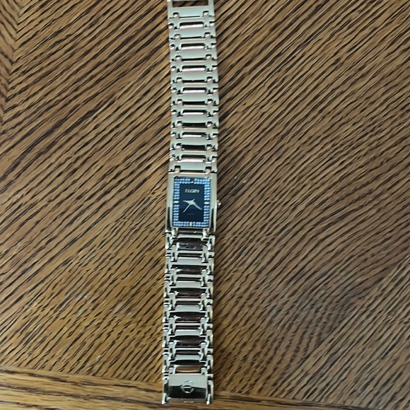 Elgin watch- gold band - black face with crystal accents on face. - Picture 1 of 3